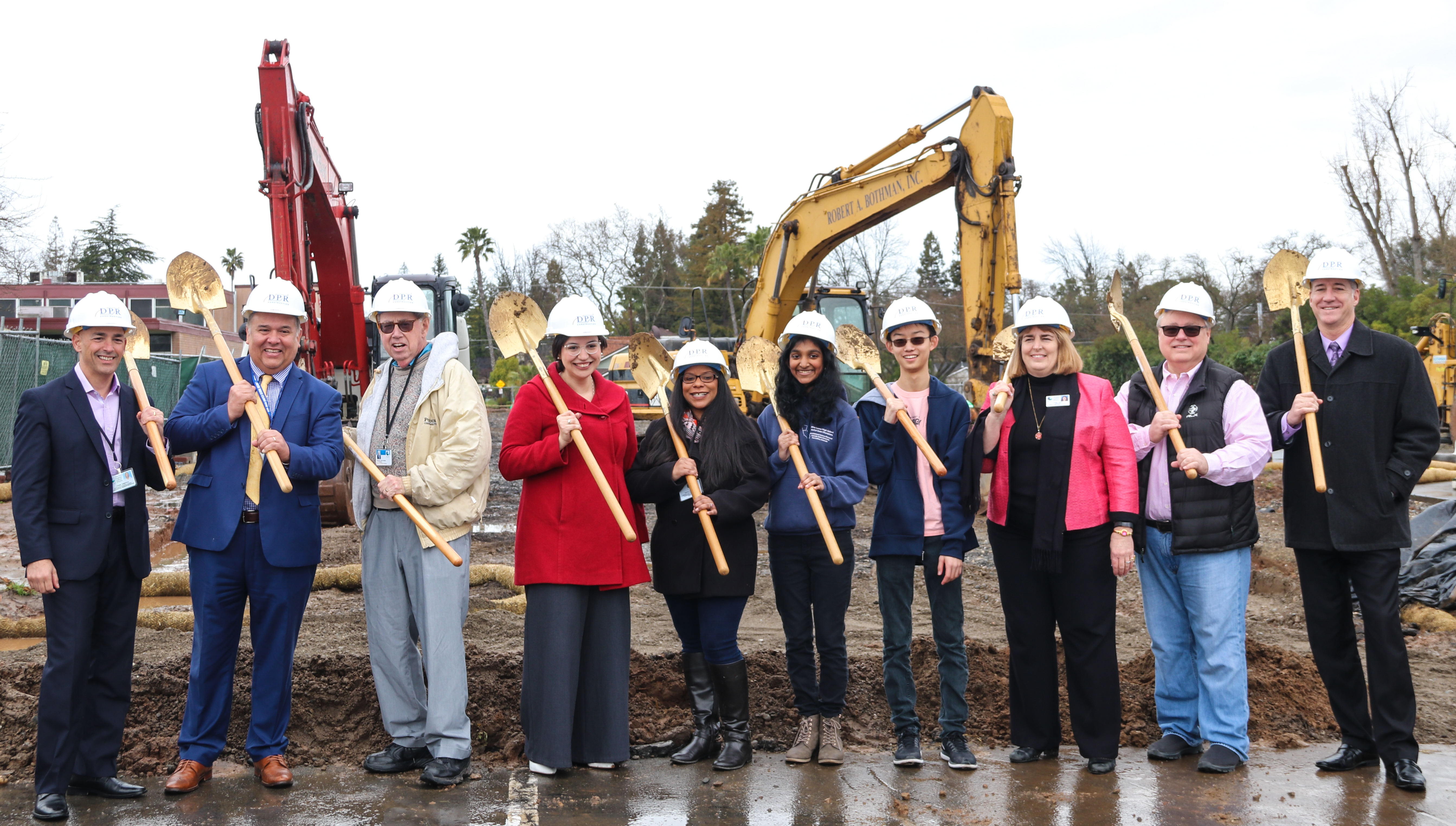 Paula Villescaz celebrating a new school groundbreaking